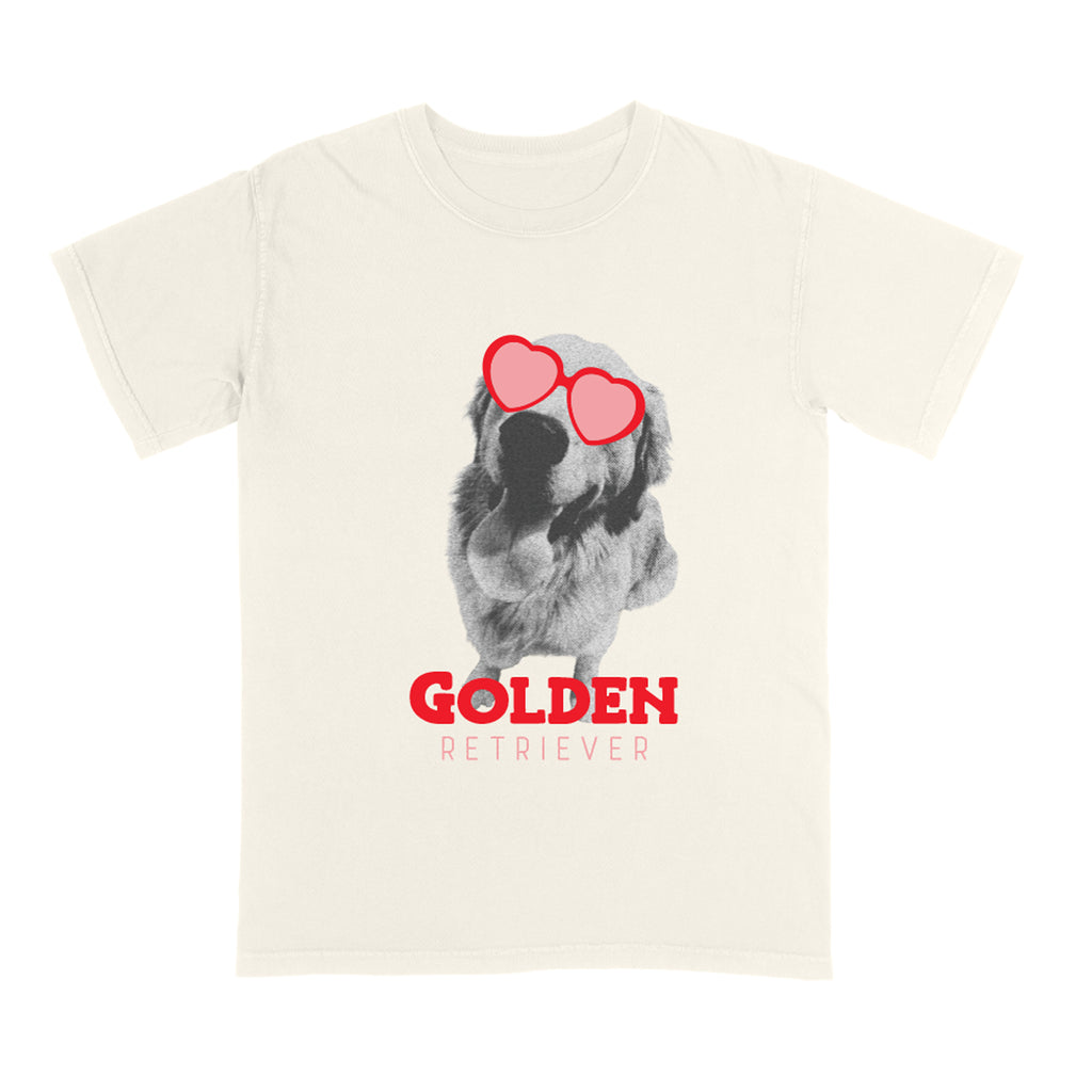 Ivory t-shirt with a graphic of a dog wearing heart sunglasses and the text 'GOLDEN RETRIEVER' on a white background.