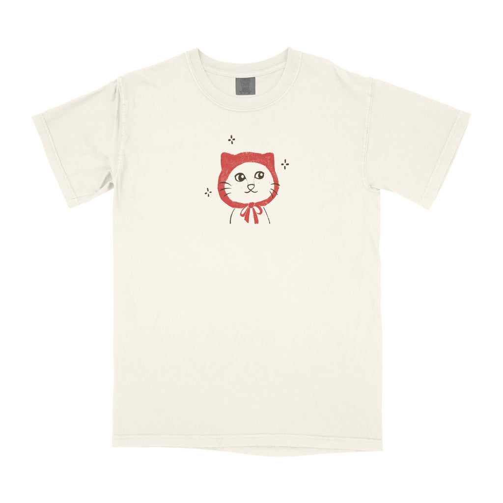Beige t-shirt with a red cat graphic on a white background