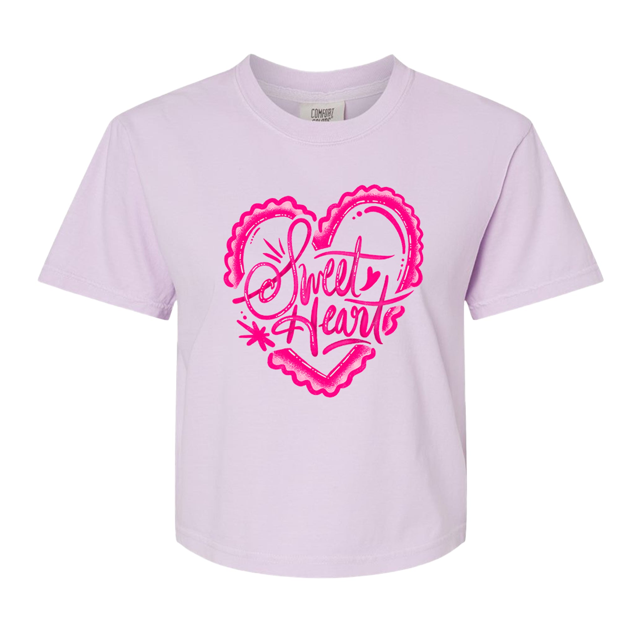 Lavender t-shirt with pink heart-shaped design and 'sweet heart' text on a white background